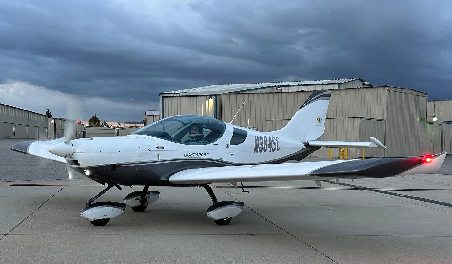 Side view of a brand new advanced training aircraft sitting on the apron