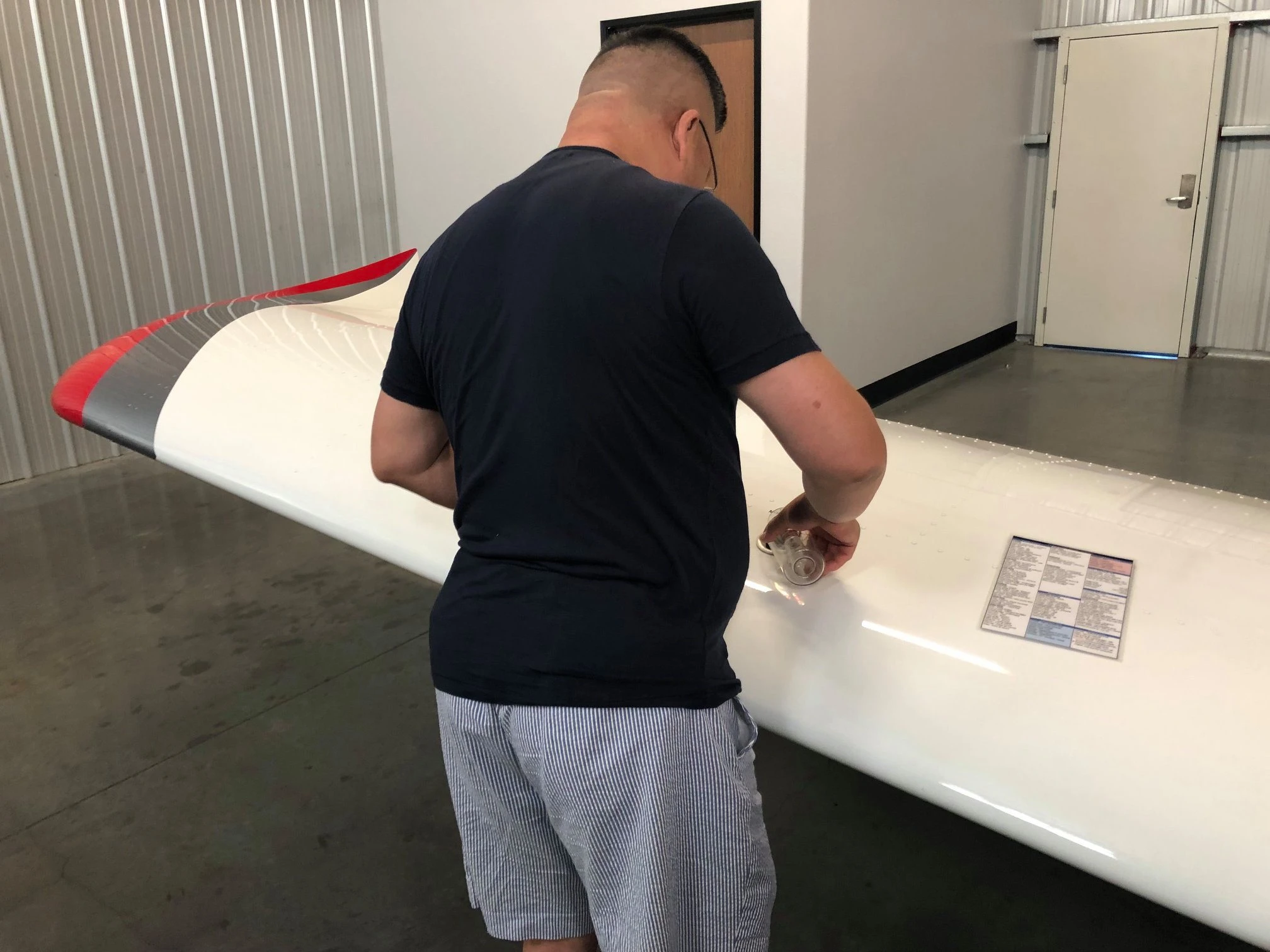 Student fueling a training aircraft